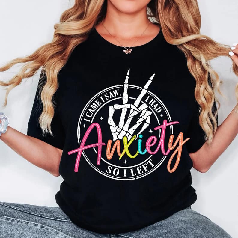 Anxiety Tee with "I came, I saw, I had anxiety, so I left" design, printed on Bella + Canvas fabric.