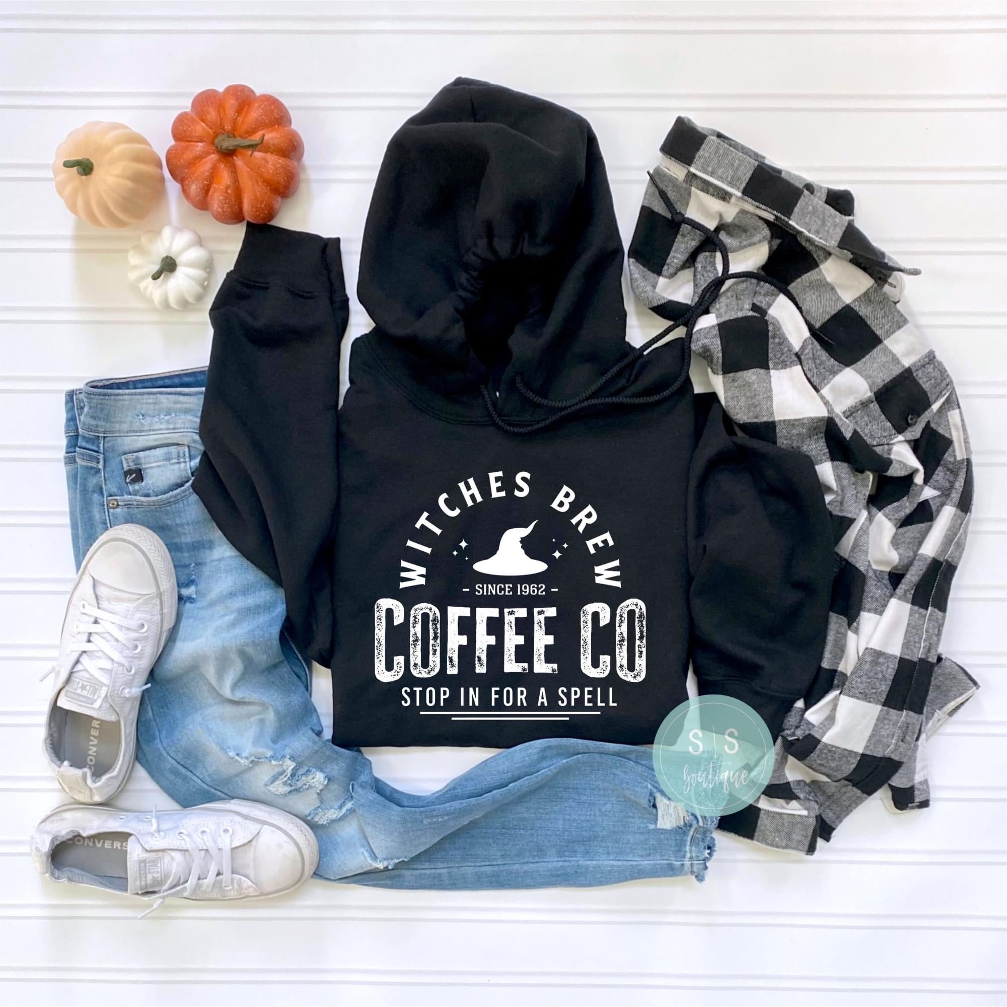 Witches Brew Hoodie with Halloween coffee design, fleece-lined, unisex fit.