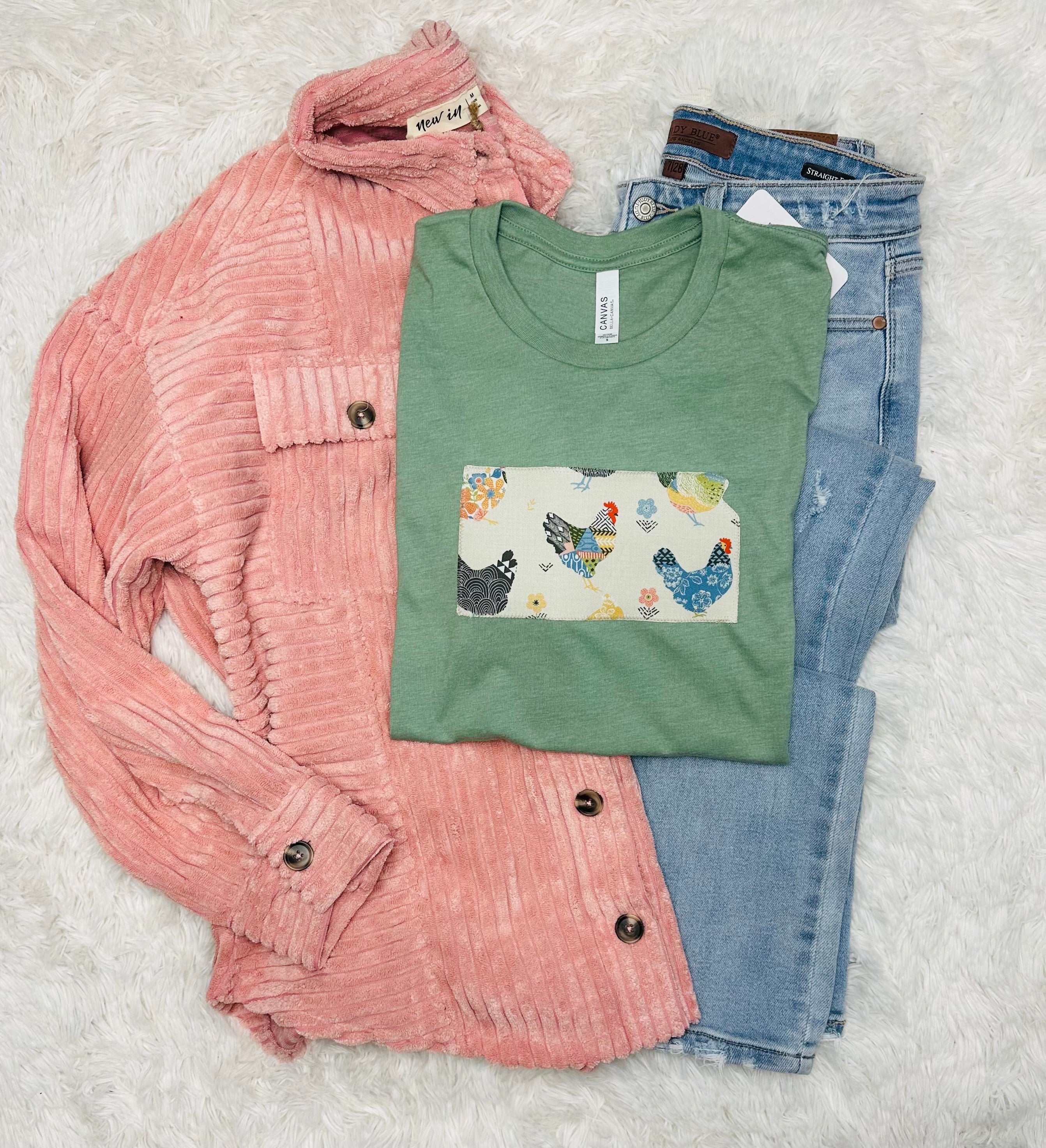 Chicken State Sage Tee on a Bella + Canvas shirt, showcasing a unique hand-sewn state fabric design.