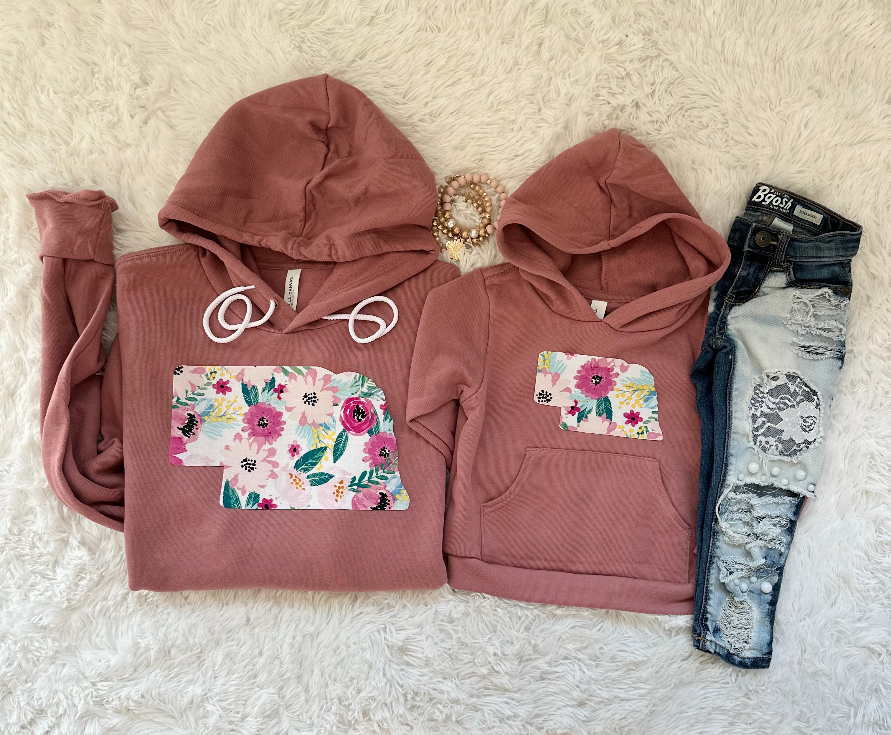 Pink Floral State Mauve Hoodie featuring a unique hand-sewn state fabric design on premium Bella + Canvas unisex fit sweatshirts.