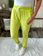 Tommy Two Tone waffle joggers in Lime, contrast detailing, functional waist drawstring, side pockets, banded hemline, shown in various sizes