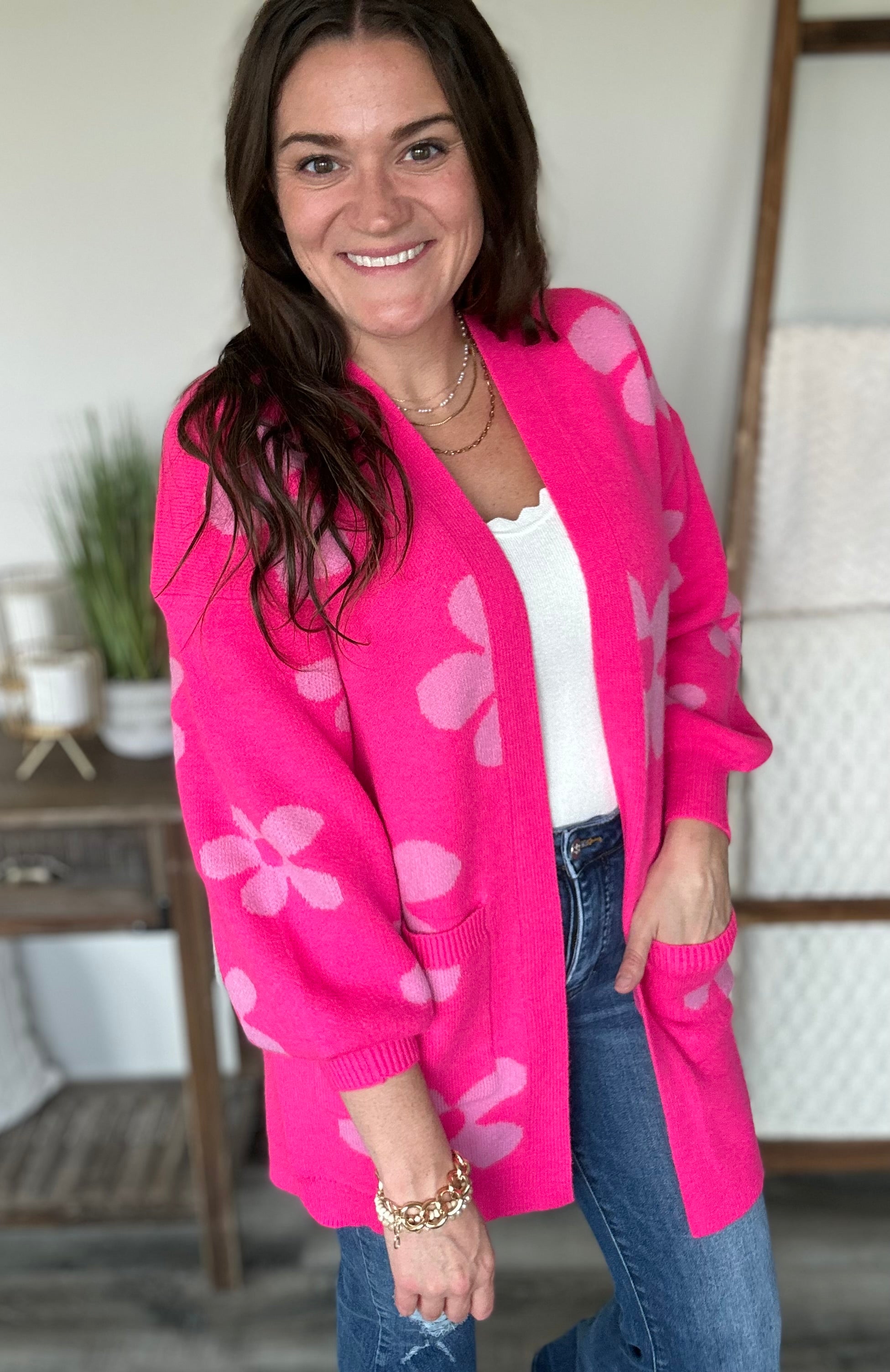 styled view of Enough Anyways Floral Cardigan in Pink with oversized fit, open front, balloon sleeves, and vibrant floral print for a bold and stylish look.
