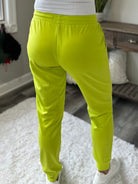 back view of Tommy Two Tone waffle joggers in Lime, contrast detailing, functional waist drawstring, side pockets, banded hemline, shown in various sizes