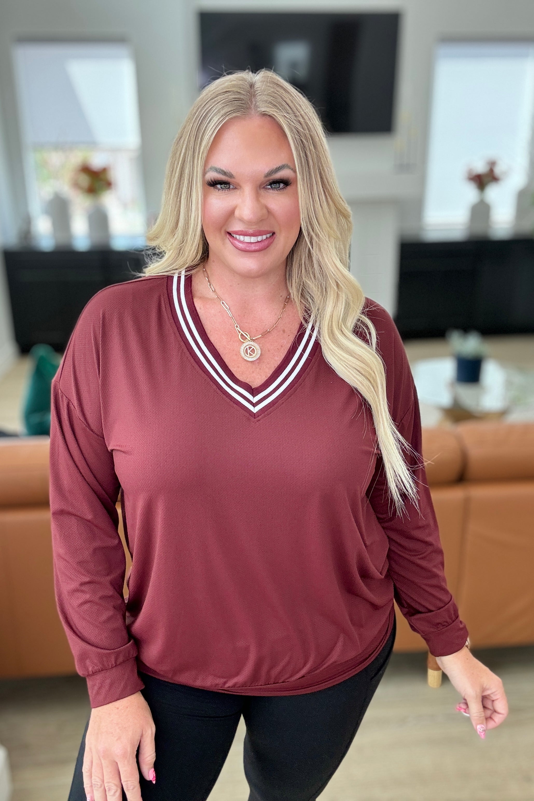 alternate front view of All Out Comfort V-Neck Pullover in Red Merlot with a contrast V-neckline, drop shoulders, and banded cuffs. Breathable, moisture-wicking nylon fabric for cozy wear.