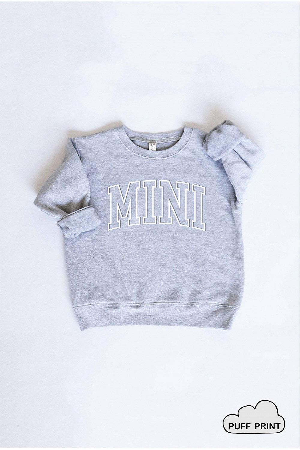 Puff Mini Bella Toddler Sweatshirt by Oat Collective, snuggly soft with a unisex fit. Perfect for cozy comfort in a premium toddler sweatshirt.