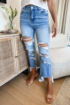 Urban Distressed High Rise Crop Jeans with raw hem