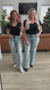 video showing detail of Dory High Waist Mineral Wash Wide Leg Jeans with raw hem and high-rise fit